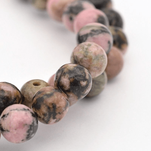 Rhodonite Marbrée perles rondes et polies - A l'unité