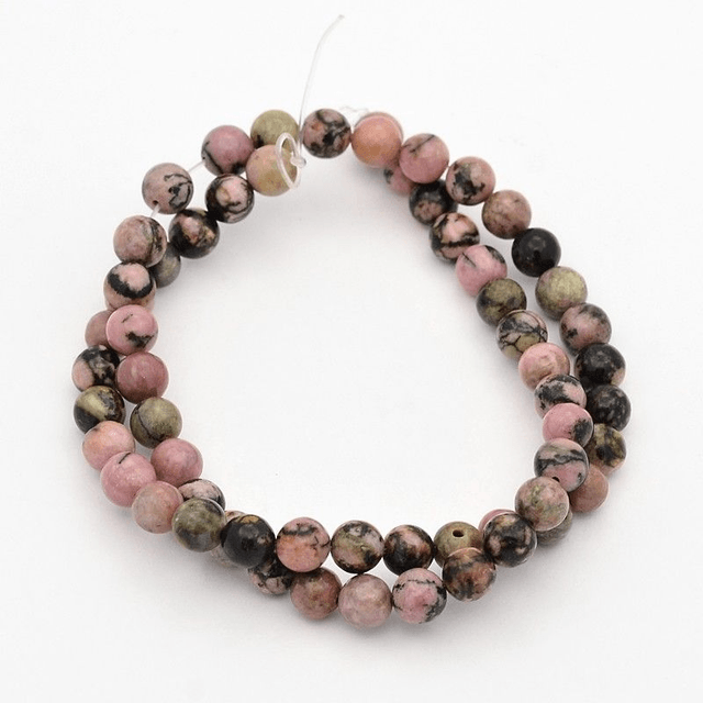 Rhodonite Marbrée perles rondes et polies - A l'unité